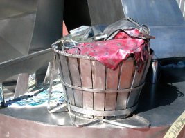 Wendy Rose's Basket is modeled after the fruit baskets that many women used as laundry baskets at the time. It includes her welding helmet, kerchief and kitchen apron. She brings a little of her home life with her as she enters the new world of the workforce.
